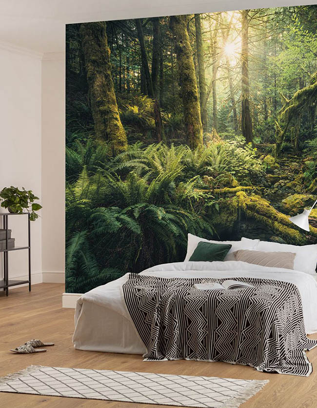 Camera da letto con carta da parati verde giungla