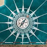 Painted compass in turquoise