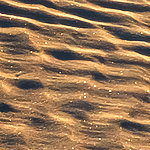 Des vagues dans le sable