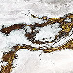 White marble surface in gold with gold detailing