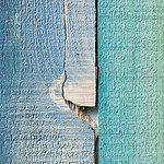 Painted wood in blue with a green sheen