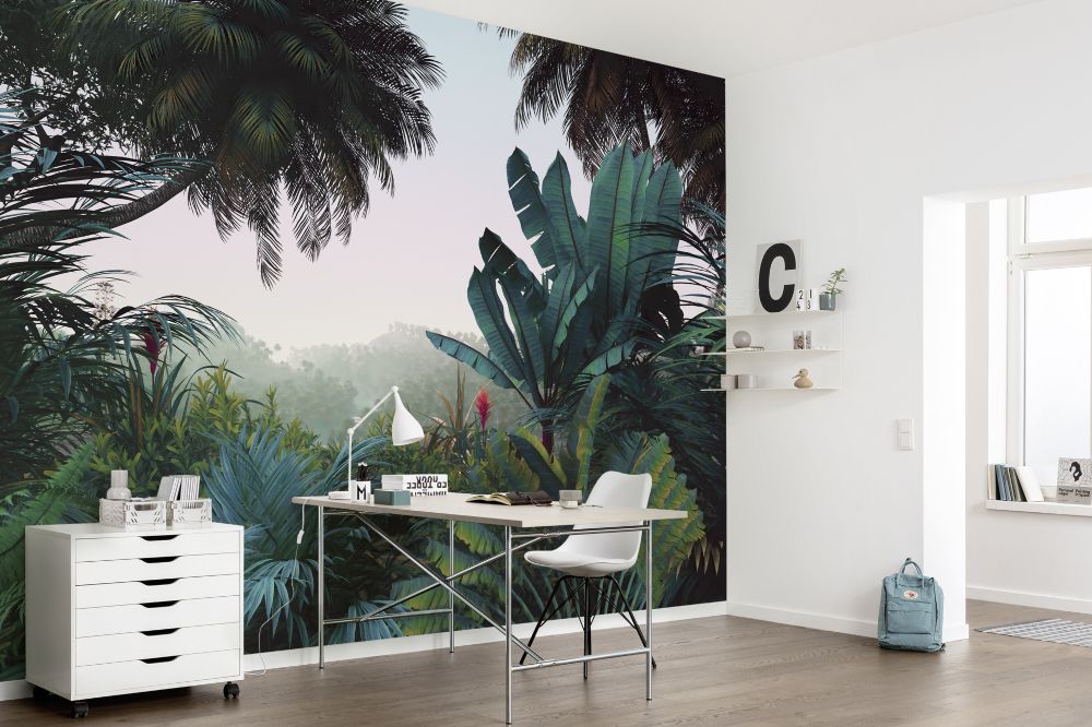 Tropical forest with large palm leaves